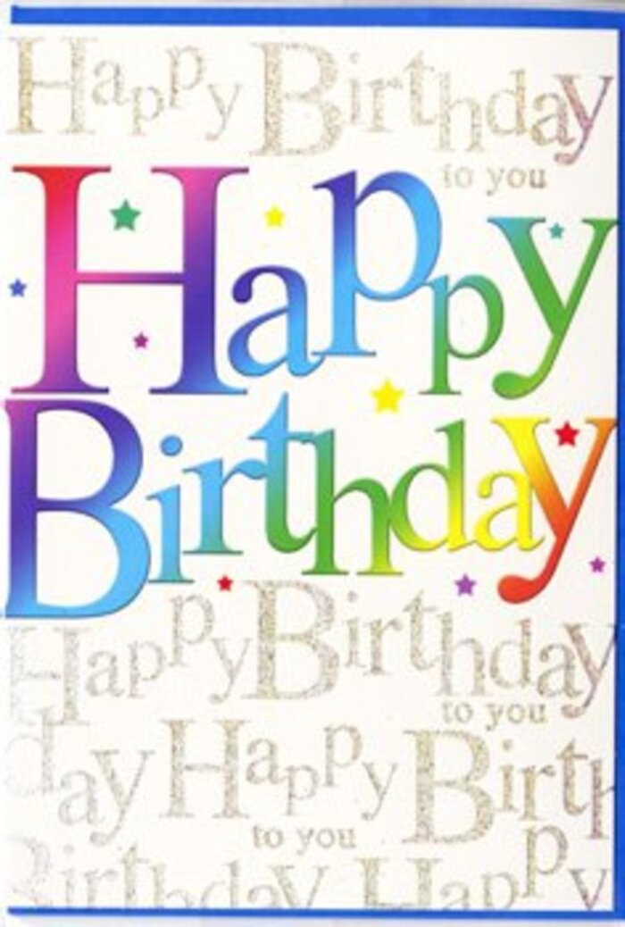 A richly designed birthday card lies flat, its surface shimmering softly, as though catching the gentle daylight that filters across Charlton's quiet residential streets. The words Happy Birthday dominate the scene in big, confident lettering that curves slightly, giving the message a sense of movement and joy. Each individual letter is filled with a silky gradient of colour, transitioning smoothly from one shade to the next: dark crimson that feels almost velvety, warming into rosy pink and apricot; then bright citrus orange and lemon, before shifting into fresh leaf green, cool lagoon blue, and finally plum-toned purple. These rainbow hues are saturated but not harsh, echoing the richness of freshly cut blooms gathered in a hand-tied bouquet from a local Charlton florist. The letters have a subtle gloss, suggesting a premium print finish, and they stand out clearly against a pale background that glows quietly beneath them. That background is densely scripted with the phrase Happy Birthday to you, written over and over in a delicate, looping gold hand that resembles fine calligraphy. The metallic ink catches the light, creating a scattered, star-like sparkle that moves when the card is tilted, giving a sense of gentle animation, like the flicker of candles in a birthday cake. The repeated script creates a textured pattern that adds depth without overpowering the main message, balancing bold vibrancy with refined detail. This thoughtful interplay of colour and shimmer makes the card versatile enough for many ages and personalities, from a fun gathering near Charlton Park to a cosy family dinner at home. It feels like a card chosen with care, meant to sit proudly alongside a birthday arrangement and quietly convey, with warmth and style, that this is truly a day worth celebrating.