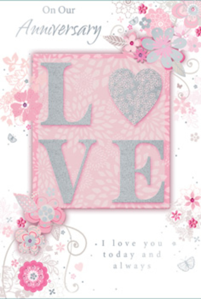 The image shows an anniversary card that combines refined design with a cosy sense of intimacy, much like a hand-delivered bouquet arriving at a doorstep off Charlton Church Lane. The central focus is the word LOVE, embossed to create a gentle three-dimensional effect. Each letter has rounded edges and a softness of form, filled with light blush pink and topped with a fine glitter that catches light in tiny, shimmering flecks of silver and pearl. The raised surface looks smooth yet textured, inviting touch and giving the card a luxurious, keepsake quality. Flowing outwards from this central word, a sweeping pattern of hand-drawn flowers, buds, and leaves stretches across the card, their arrangement loosely echoing the arc of a classic anniversary bouquet. The blossoms are rendered in stylised detail, with slender outlines and fine shading that create depth while maintaining a dreamy, romantic feel. Shades of powder pink, pearlescent white, muted mauve, and gentle grey blend seamlessly, suggesting petals that have just unfurled at the start of spring. Some flowers appear closer and more defined, while others fade softly into the blush pink background, which itself is smooth and subtly gradated. Among the larger blooms, tiny decorative flourishes and almost-hidden butterfly shapes can be seen, adding a whimsical, fluttering energy. Silver accents highlight select petals and leaf edges, providing a delicate metallic glint. Toward the lower section of the card, in elegant, flowing script and small serif letters, a loving anniversary sentiment is inscribed, speaking of enduring affection, shared memories, and commitment. The entire piece feels like a gentle visual poem-an ideal accompaniment to a pastel bouquet ordered from Charlton Flowers to mark another cherished year together.
