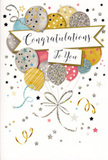 The card shown in the image offers a gentle yet unmistakable sense of celebration, ideal for pairing with a fresh floral delivery anywhere in Charlton. Its front is dominated by a cheerful gathering of illustrated balloons arranged in a loose cluster that seems to rise from the lower edge of the card, as if drifting upward into a clear SE7 sky. The balloons are smooth and rounded, overlapping one another to create an impression of fullness and depth, much like a real party bouquet you might see at a family gathering near Charlton Park. The colours are thoughtfully chosen: shimmering gold, polished silver, delicate champagne, powder blue, soft blush pink, and a subtle grey, all softened to keep the design refined. Each balloon carries a unique decoration-tiny stars scattered like confetti, fine glitter that suggests sparkle, or narrow stripes that add gentle movement-so the group feels varied yet cohesive. From the balloon knots, slim metallic ribbons cascade downward in loose spirals of gold and silver, curving gracefully across the design like ribbon tails hanging from a gift. Across the middle of the card, a pale banner rests lightly over the balloon cluster, its curved shape mirroring the gentle arc of the balloons behind it. The words Congratulations To You are written across this banner in fluid, decorative script, giving the message warmth and elegance. The background remains clean and uncluttered, an off-white canvas accented with tiny stars, dots, and swirling flourishes in metallic tones that recall confetti floating in the air after a heartfelt toast. The overall mood is light, joyful, and quietly glamorous, making this card a fitting companion to mark exam results, new jobs, or personal milestones for friends and neighbours throughout Charlton.